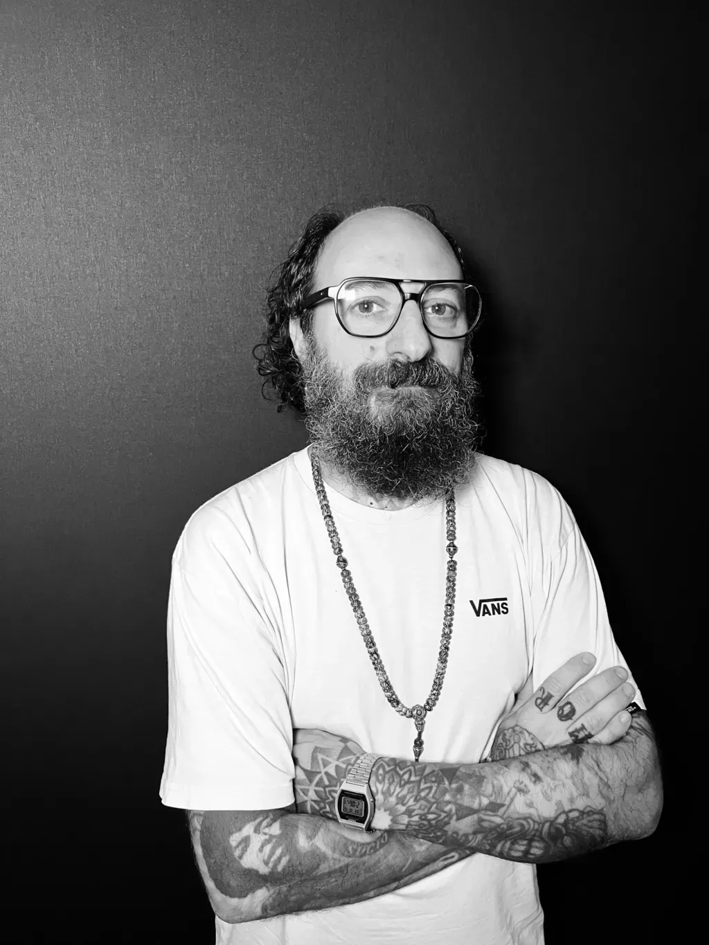Portrait of Mariano “El Tata”, tattoo artist at Arrels Tattoo
