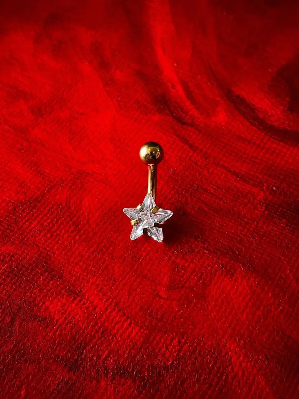 Star Navel Jewellery, piercing work performed by Ramiro at Arrels Tattoo