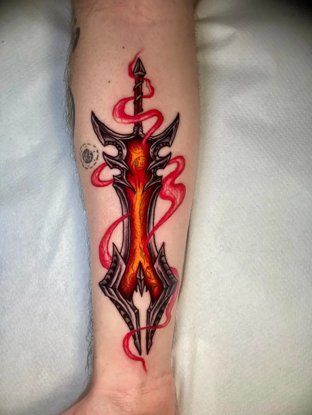 Flaming Sword, tattoo by Marcel