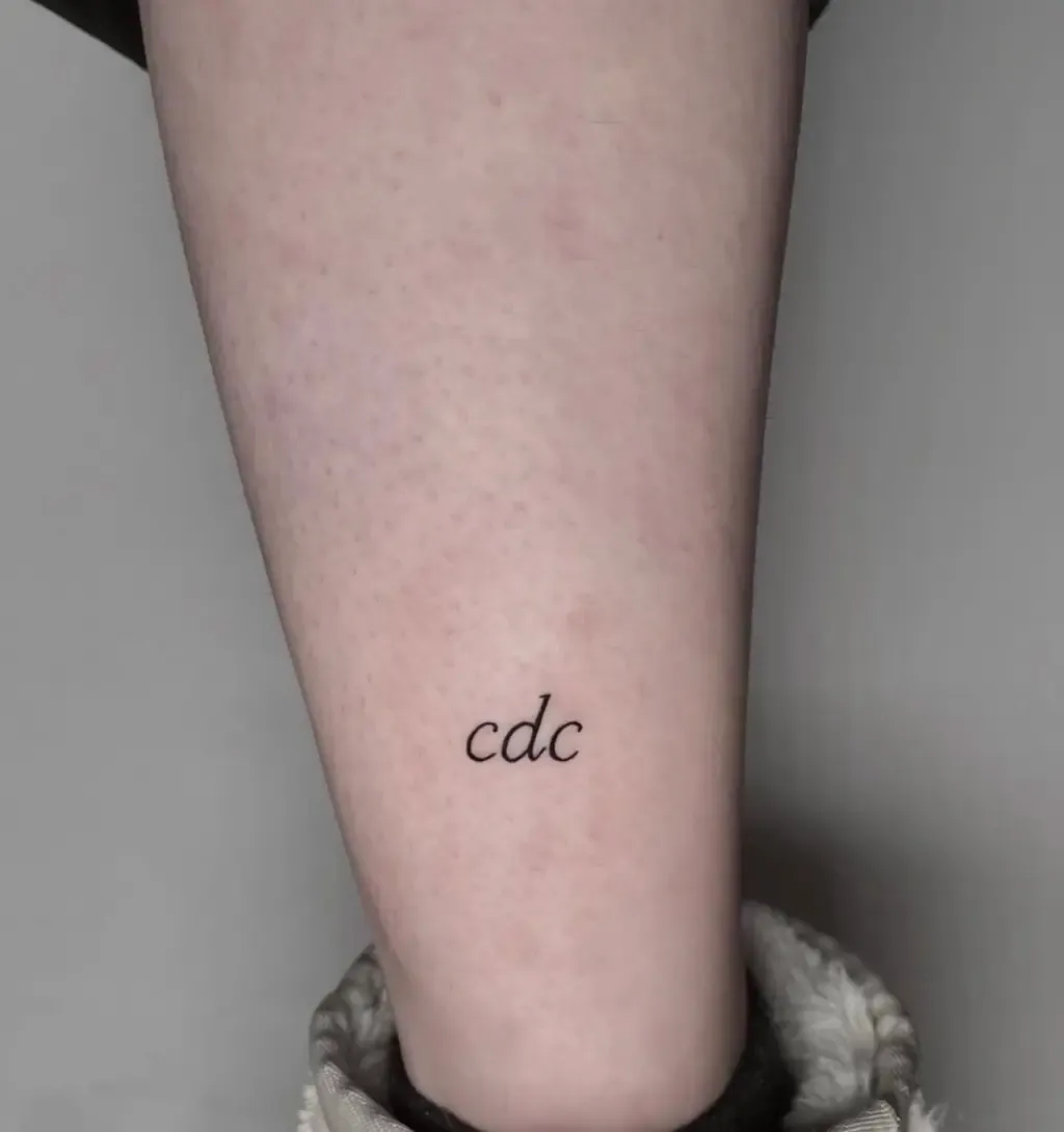 Name Initials, tattoo by Ramiro Miret